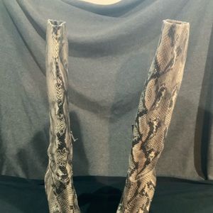Brand new snake knee high boots